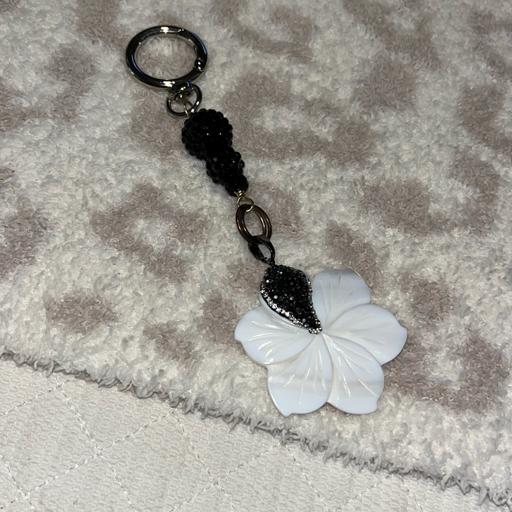 Hand made charm black and white carved  shell flower
